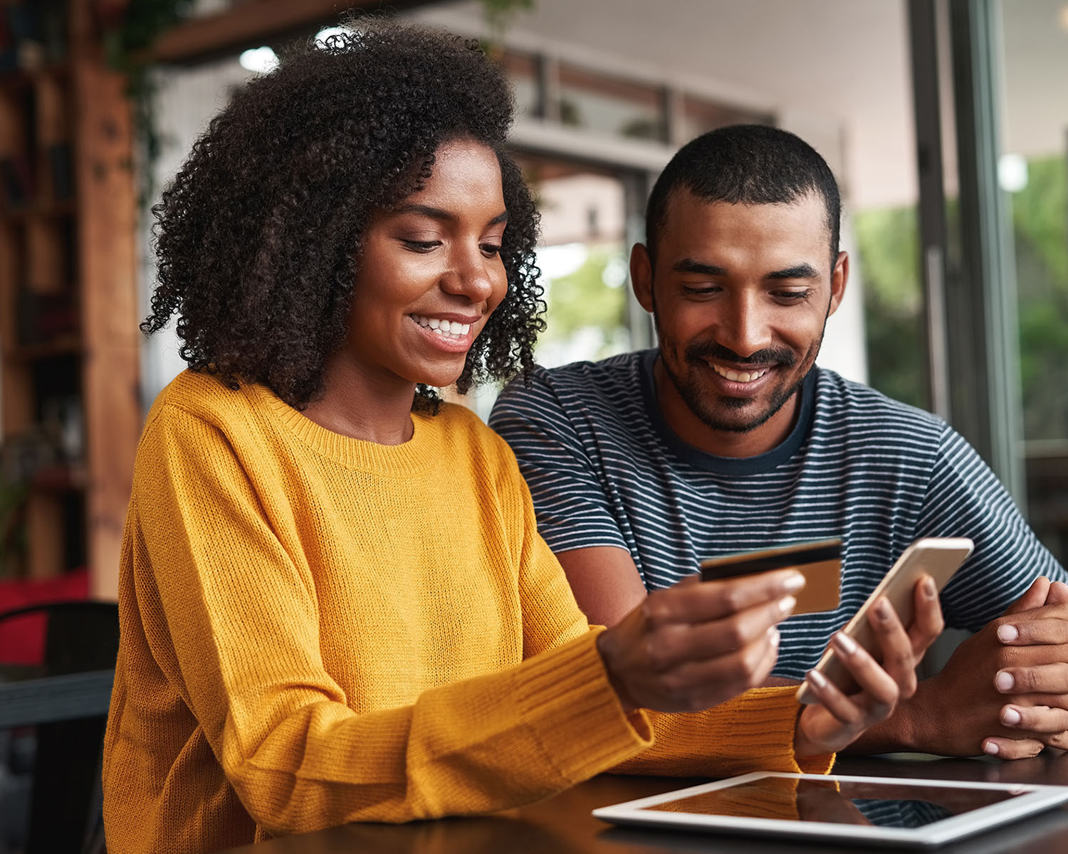 couple using remote capture on mobile device.