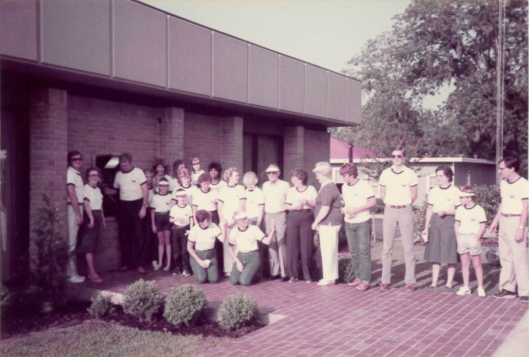 old photo of first port city bank employees from the 1970's